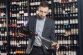 Sommelier pouring red wine into carafe decanter to make aeration drink Royalty Free Stock Photo