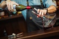 Sommelier pouring red wine into carafe to make perfect color Royalty Free Stock Photo