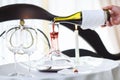 A sommelier pouring red wine into decanter Royalty Free Stock Photo