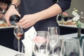 Sommelier pouring wine to the wine glass Royalty Free Stock Photo