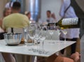 Sommelier pours white wine during Shabo winery degustation, Ukraine