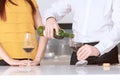 Sommelier pours wine into glass Royalty Free Stock Photo