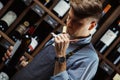 Sommelier smelling flavor of cork from red wine Royalty Free Stock Photo