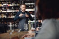 Sommelier talks about varieties of white wine for waiters and bartenders of restaurant Royalty Free Stock Photo