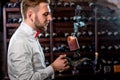 Sommelier in the wine cellar Royalty Free Stock Photo