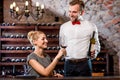 Sommelier with young woman on degustation in the Royalty Free Stock Photo