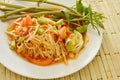 Somtum Thai green papaya salad tasted spicy sour and sweet on dish