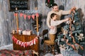 Son and dad decorating the christmas tree at home Royalty Free Stock Photo