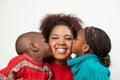 Son and daughter kissing her mother Royalty Free Stock Photo