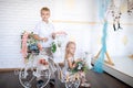 Son and daughter in a white room Royalty Free Stock Photo