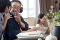 Son disturbs father while working. Royalty Free Stock Photo