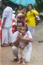 Son and father pray for chinese god during vegetarian festival in Palian of Trang, Thailand