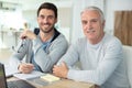 son and father using laptop at home Royalty Free Stock Photo