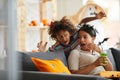 Son having jump scare while frightening mother