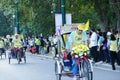 The son with his father riding the tricycle around Chiang Mai