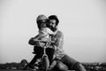 Son hugging Father. Daddy and child playing on summer vacation. Love, fatherhood and family concept. Father's Day