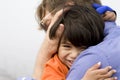 Son hugging his father Royalty Free Stock Photo