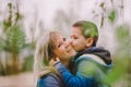 Son is kissing his mother outdoor Royalty Free Stock Photo