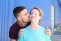 Son kissing his mother portrait