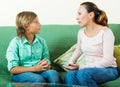 Son and mother having serious talking Royalty Free Stock Photo