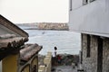 Son and mother walking on street of ?ncient city of Sozopol in Bulgaria Royalty Free Stock Photo