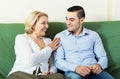 Son talking with senior mother Royalty Free Stock Photo