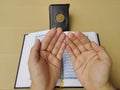 son's hands in mosque praying and reading holly book quran together islamic education concept Royalty Free Stock Photo