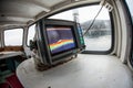 A sonar mounted in a wooden fishing boat, showing the sea bed