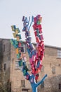 Lots of colorful bird boxes on tree in Sonderborg