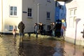 Sandbags block the road during a flood. Royalty Free Stock Photo