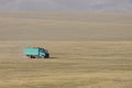 Song Kul, Kyrgyzstan, August 8 2018: A truck drives through the steppe at Song Kul Lake in Kyrgyzstan