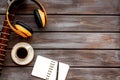 Song writer set with guitar, earphones, notebook as musician and DJ instruments wooden background flatlay space for text Royalty Free Stock Photo