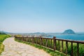 Songaksan Mountain trail with sea and Sanbangsan Mountain in Jeju Island, Korea