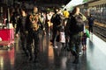 Songkhla, Thailand : April 11, 2021 - Rear view group of soldiers walking in the platform of Hat Yai train station for security