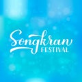 Songkran calligraphy hand lettering on blue background. Thailand water festival celebration typography poster. Vector template for Royalty Free Stock Photo