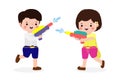 Songkran festival young couple holding water gun enjoy splashing water Thailand Traditional New Year\'s Day Royalty Free Stock Photo