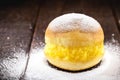 Sonho, sweet bread stuffed with cream, made with eggs, baumilia, sugar, milk and yeast. It is typical of Brazil, Portugal and Royalty Free Stock Photo