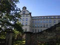 Sonnenstein castle behind wall and trees in Pirna Royalty Free Stock Photo