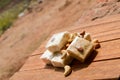 sonpapdi barfi type on wooden table Royalty Free Stock Photo