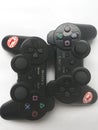 Sony Black PlayStation game controller on white background Royalty Free Stock Photo
