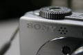 Sony inscription on silver compact camera