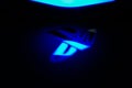 Sony Playstation logo illuminated on blue light from game controller