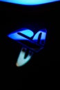 Sony Playstation logo illuminated on blue light from game controller