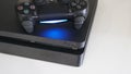 Sony PlayStation 4 Slim PS4 with DualShock 4 controller, Home video game console Royalty Free Stock Photo