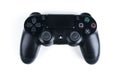 Sony PlayStation 4 Slim 1Tb revision and dualshock game controller. Game console with a joystick. Home video game console on white Royalty Free Stock Photo