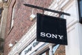 Sony store shop centre sign hanging on the side of high street store building Royalty Free Stock Photo