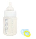 Soother and feeding bottle Royalty Free Stock Photo