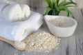 a soothing oatmeal bath preparation with colloidal oatmeal and a towel Royalty Free Stock Photo