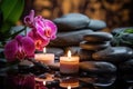 Spa Still Life with Orchids, Stones, and Candles Royalty Free Stock Photo