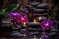 Spa Still Life with Orchids, Stones, and Candles Royalty Free Stock Photo